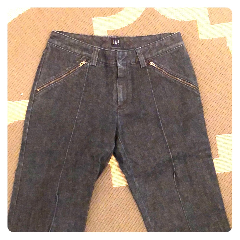 Denim trousers with zipper pockets